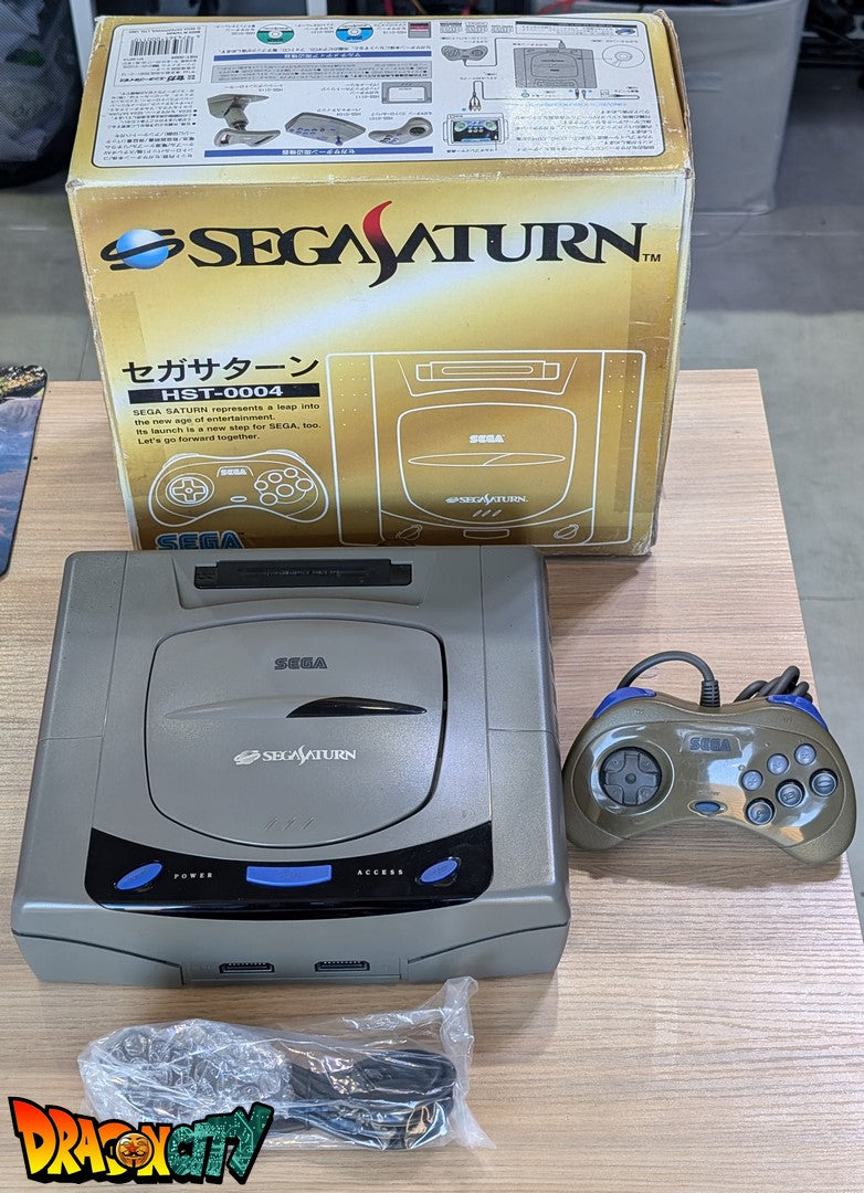 Saturn JAP Grise 60Hz + Boîte + Alimentation SAT-Psu + Bios Freezone + Mémoire FRAM + Câble RGB