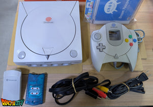 Dreamcast VA0 60Hz + Bios Freezone + Patch 50Hz/60Hz Auto + Boîte + Alimentation 220V + 1 Manette + Notices + Dream Passport 1 et 3 + Câble Vidéo + Câble Alimentation + Serial Matching + Câble RJ11 + Condensateurs GDROM changés (neuf) + VMU + Jump Pack