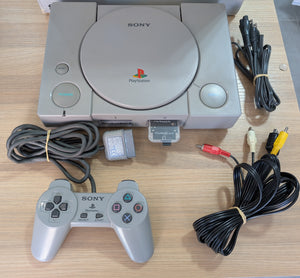 Console Sony PlayStation 1 (PS1) SCPH-7000 NTSC-J 60Hz - Version Dual Shock + Boîte + Manette PS1 + Câble Vidéo + Cable d'alimentation 110V +  PSxMemCard (Lecture Backups + Imports) + Blocage Capot (Impression 3D)