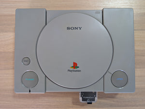 Console Sony PlayStation 1 (PS1) SCPH-7000 NTSC-J 60Hz - Version Dual Shock + Boîte + Manette PS1 + Câble Vidéo + Cable d'alimentation 110V +  PSxMemCard (Lecture Backups + Imports) + Blocage Capot (Impression 3D)